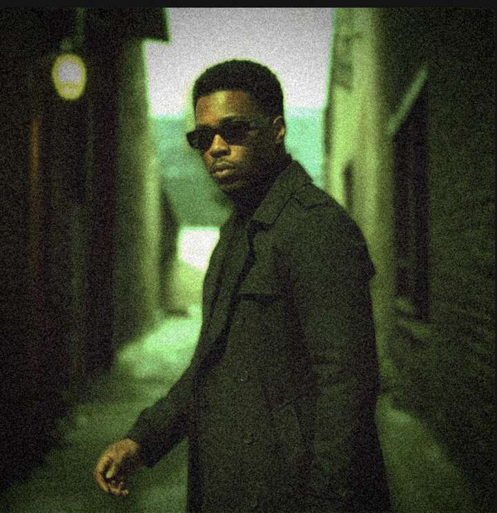 K.R.W.N. walking through a green-lit alley, matrix code overlay